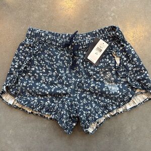 Adorable blue floral ruffle trim shorts